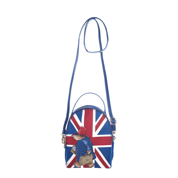 Paddington bear mini pack bag with the straps showing how big it can be. Blue bag with a Union Jack on the front and Paddington with a briefcase.